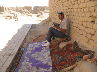 A local man playing music inside the ruins (Michael Long, 2015)