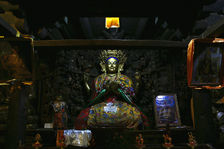 Bodhisattva Avalokitesvara on the altar with offerings