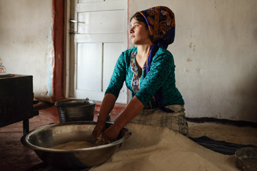 The newest bride in the family is usually responsible for baking bread. In a household of 10 adults, a tamdyr of bread (10 loaves) must be baked every 3 or 4 days (Cara Kerven, 2016) The newest bride in the family is usually responsible for baking bread. In a household of 10 adults, a tamdyr of bread (10 loaves) must be baked every 3 or 4 days (Cara Kerven, 2016)
