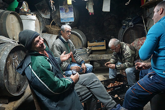 Men in conversation