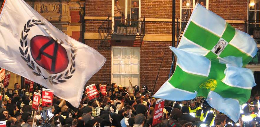 Drinks party guests peer down as Anonymous activists are confronted by police. (credit: Vita Peacock, 5 November 2015, London) Drinks party guests peer down as Anonymous activists are confronted by police. (credit: Vita Peacock, 5 November 2015, London)