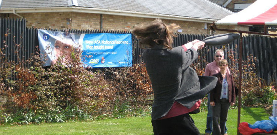 Dr Irvine eel throwing at Eel Day, Ely